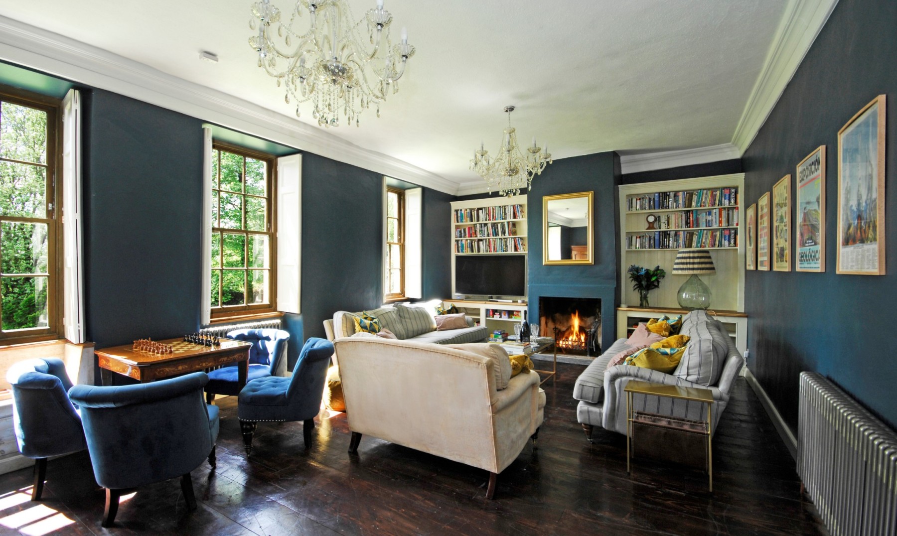 Topside House - spacious drawing room with luxury sofas and an open fire