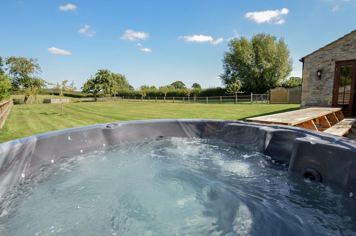 Exclusive use of a hot-tub in private lawns, with BBQ and picnic table.