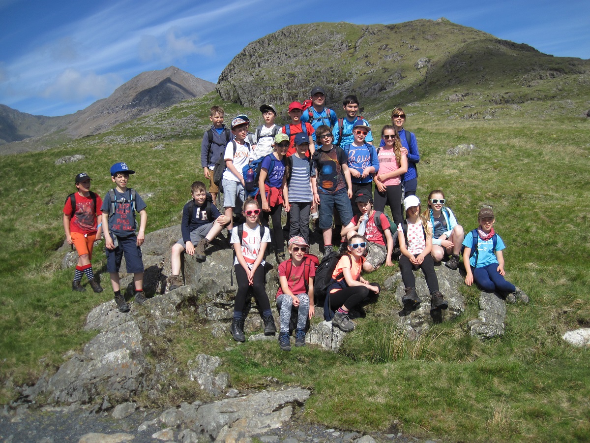 A group heading off up the mountains of Snowdonia