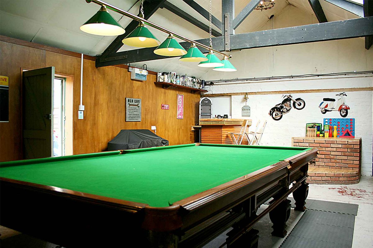 Games room with a full size snooker table and bar